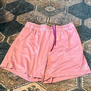 Nike Women's Pink Athletic Shorts with Purple Drawstring